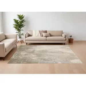 Photo of Gray and Ivory Abstract Power Loom Area Rug