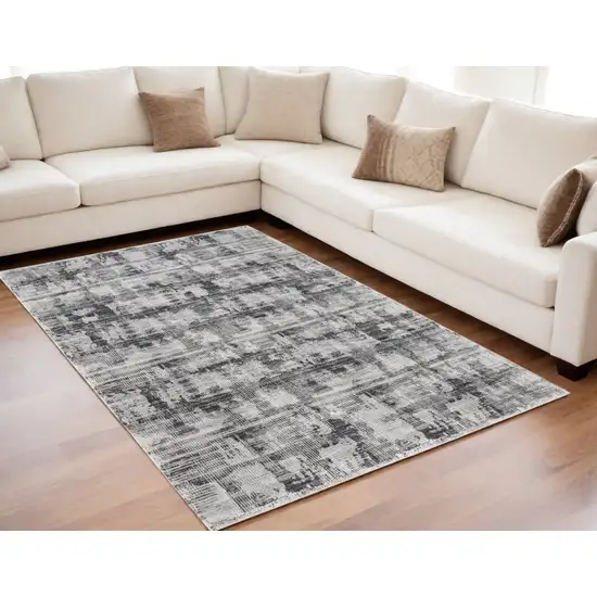 Gray and Ivory Abstract Power Loom Area Rug Photo 1