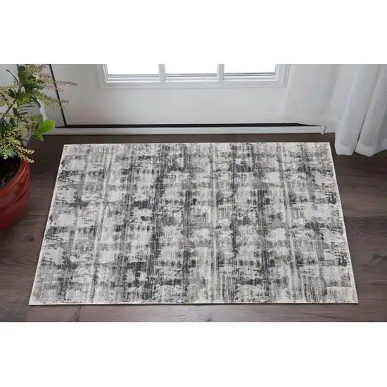 Gray and Ivory Abstract Power Loom Area Rug Photo 1