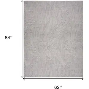 Photo of Gray and Ivory Abstract Power Loom Washable Non Skid Area Rug