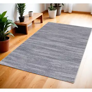 Photo of Gray and Ivory Abstract Power Loom Washable Non Skid Area Rug