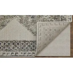 Photo of Gray and Ivory Abstract Power Loom Worn Faded Area Rug