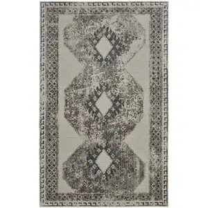 Photo of Gray and Ivory Abstract Power Loom Worn Faded Area Rug