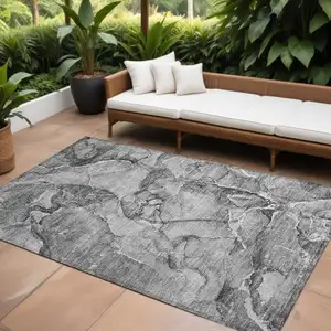 Photo of Gray and Ivory Abstract Washable Non Skid Indoor Outdoor Area Rug