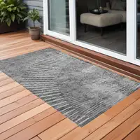 Photo of Gray and Ivory Abstract Washable Non Skid Indoor Outdoor Area Rug