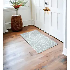 Photo of Gray and Ivory Animal Print Handmade Non Skid Area Rug