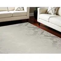 Photo of Gray and Ivory Damask Distressed Non Skid Area Rug