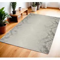 Photo of Gray and Ivory Damask Distressed Non Skid Area Rug