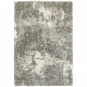 Photo of Gray and Ivory Distressed Abstract Area Rug