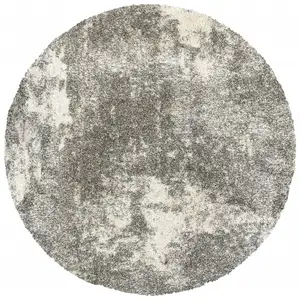 Photo of Gray and Ivory Distressed Abstract Area Rug