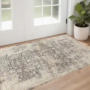 Photo of Gray and Ivory Floral Area Rug