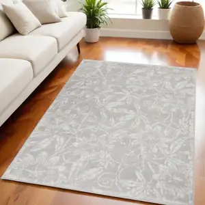 Photo of Gray and Ivory Floral Distressed Area Rug