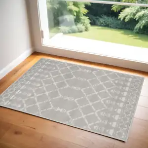 Photo of Gray and Ivory Geometric Area Rug