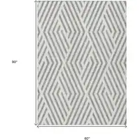 Photo of Gray and Ivory Geometric Washable Non Skid Indoor Outdoor Area Rug