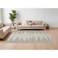 Photo of Gray and Ivory Ombre Hand Woven Area Rug