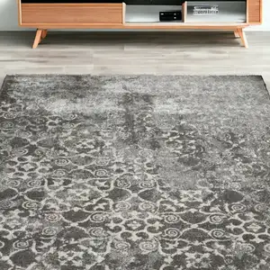 Photo of Gray and Ivory Oriental Distressed Area Rug