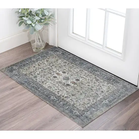 Ivory Blue and Gray Oriental Power Loom Area Rug Photo 1