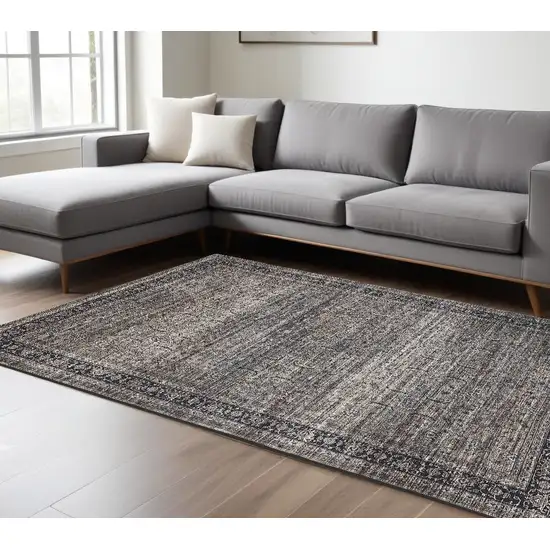 Gray and Ivory Oriental Power Loom Distressed Washable Area Rug Photo 1