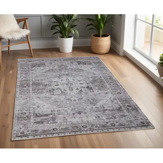 Gray and Ivory Oriental Power Loom Worn Faded Washable Area Rug Photo 1