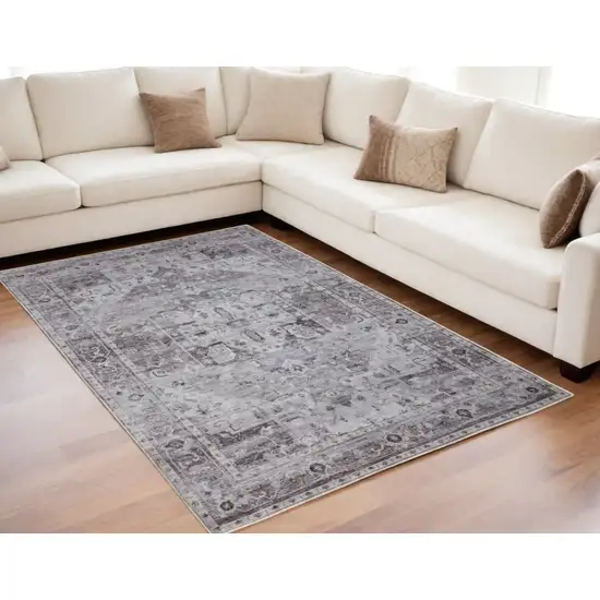 Gray and Ivory Oriental Power Loom Worn Faded Washable Area Rug Photo 1