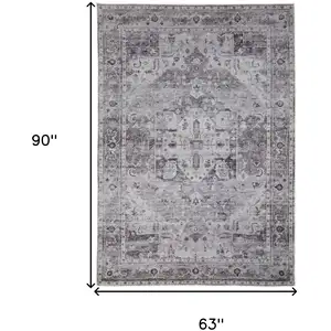 Photo of Gray and Ivory Oriental Power Loom Worn Faded Washable Area Rug