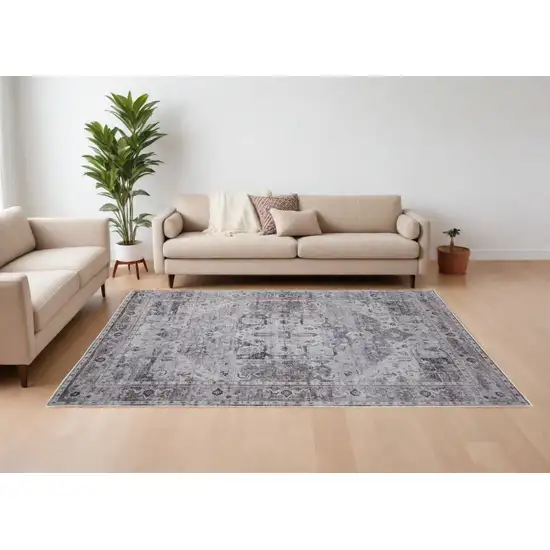 Gray and Ivory Oriental Power Loom Worn Faded Washable Area Rug Photo 1