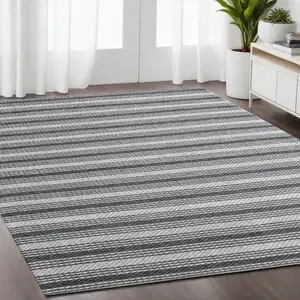 Photo of Gray and Ivory Striped Hand Woven Non Skid Area Rug