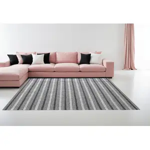 Photo of Gray and Ivory Striped Hand Woven Non Skid Area Rug