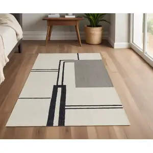 Photo of Gray and Ivory Wool Abstract Geometric Hand Tufted Area Rug