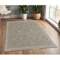 Photo of Gray and Ivory Wool Oriental Hand Knotted Area Rug With Fringe