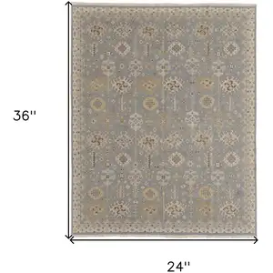 Photo of Gray and Ivory Wool Oriental Hand Knotted Area Rug With Fringe