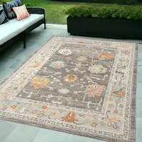 Photo of Gray and Orange Floral Stain Resistant Indoor Outdoor Area Rug