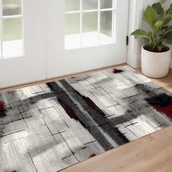 Gray and Red Abstract Distressed Area Rug Photo 1