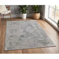 Photo of Gray and Silver Abstract Hand Woven Worn Faded Area Rug