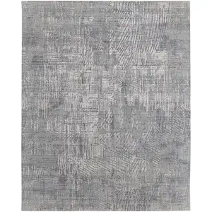 Photo of Gray and Silver Abstract Hand Woven Worn Faded Area Rug