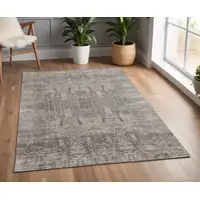 Photo of Gray and Silver Abstract Hand Woven Worn Faded Area Rug