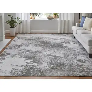 Photo of Gray and Silver Abstract Power Loom Worn Faded Area Rug