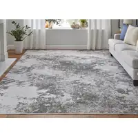 Photo of Gray and Silver Abstract Power Loom Worn Faded Area Rug