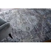 Photo of Gray and Silver Abstract Power Loom Worn Faded Area Rug