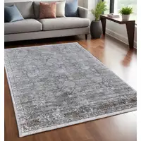 Photo of Gray and Silver Damask Power Loom Worn Faded Area Rug