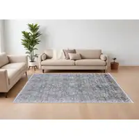 Photo of Gray and Silver Damask Power Loom Worn Faded Area Rug