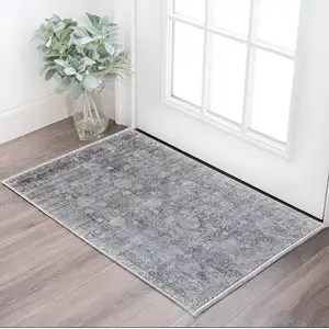 Photo of Gray and Silver Damask Power Loom Worn Faded Area Rug