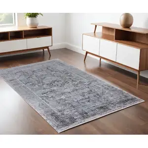 Photo of Gray and Silver Oriental Power Loom Worn Faded Area Rug