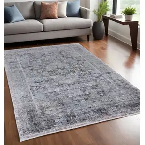 Photo of Gray and Silver Oriental Power Loom Worn Faded Area Rug