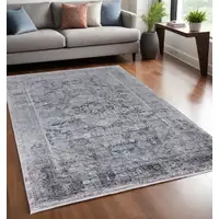 Photo of Gray and Silver Oriental Power Loom Worn Faded Area Rug