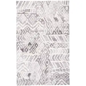 Photo of Gray and White Abstract Geometric Hand Tufted Distressed Area Rug