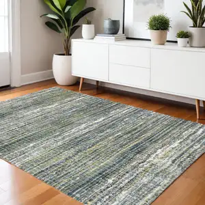 Photo of Green And Blue Geometric Distressed Area Rug