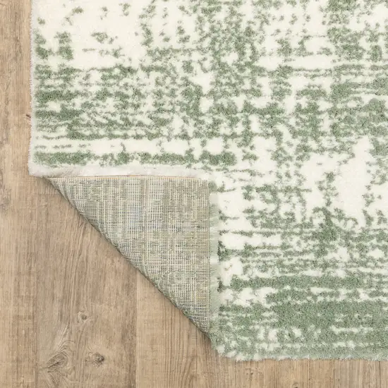 Green And Ivory Abstract Area Rug Photo 5