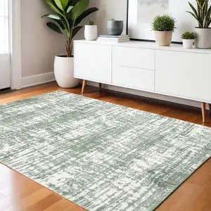 Photo of Green And Ivory Abstract Area Rug