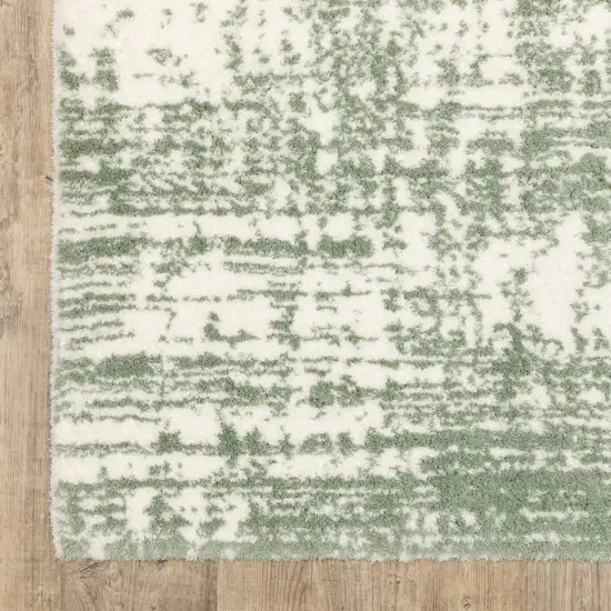 Green And Ivory Abstract Area Rug Photo 6